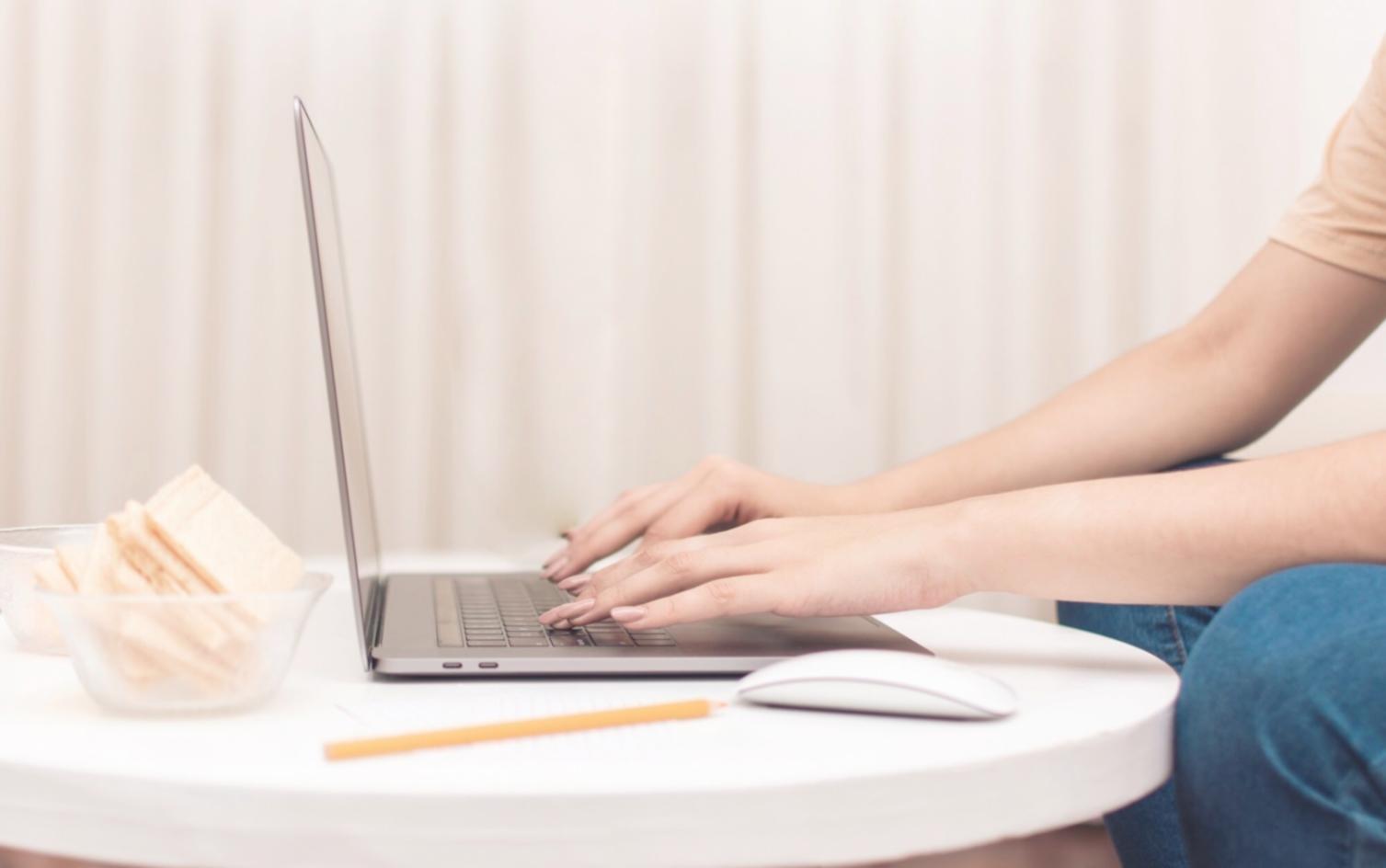 Team members collaborating on new financial education curriculum in the Mechelen office